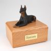 Laying Black Doberman Dog Figurine Urn PetsToRemember.com