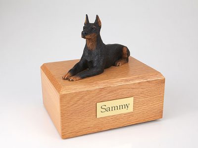 Laying Black Doberman Dog Figurine Urn PetsToRemember.com